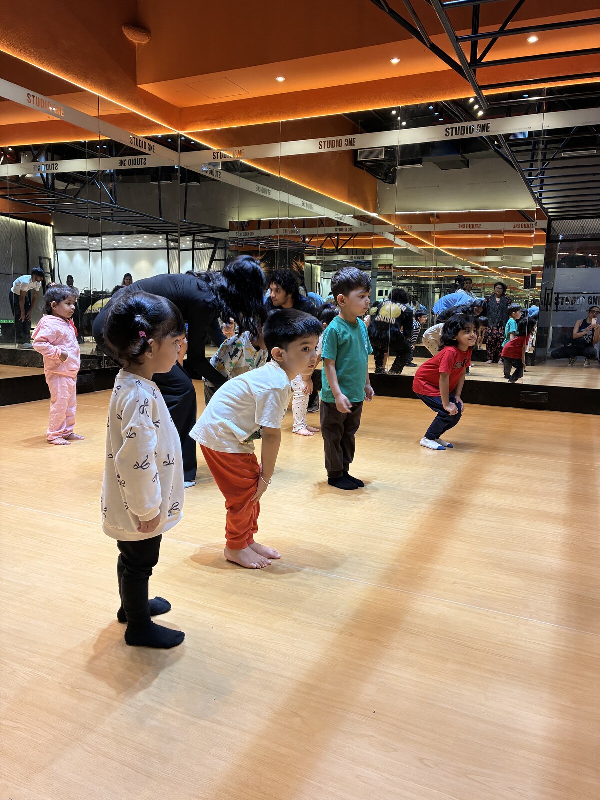 Children enjoying an active calisthenics session